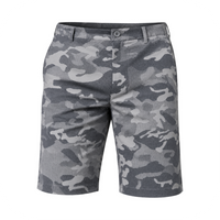 Front view of grey camouflage golf shorts on a white background.