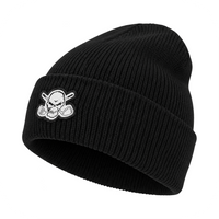 Black cuffed knit beanie with a white skull patch on a white background.