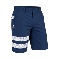 Angled view of navy golf shorts showing white patterned leg bands, pocket trim and a small skull logo.