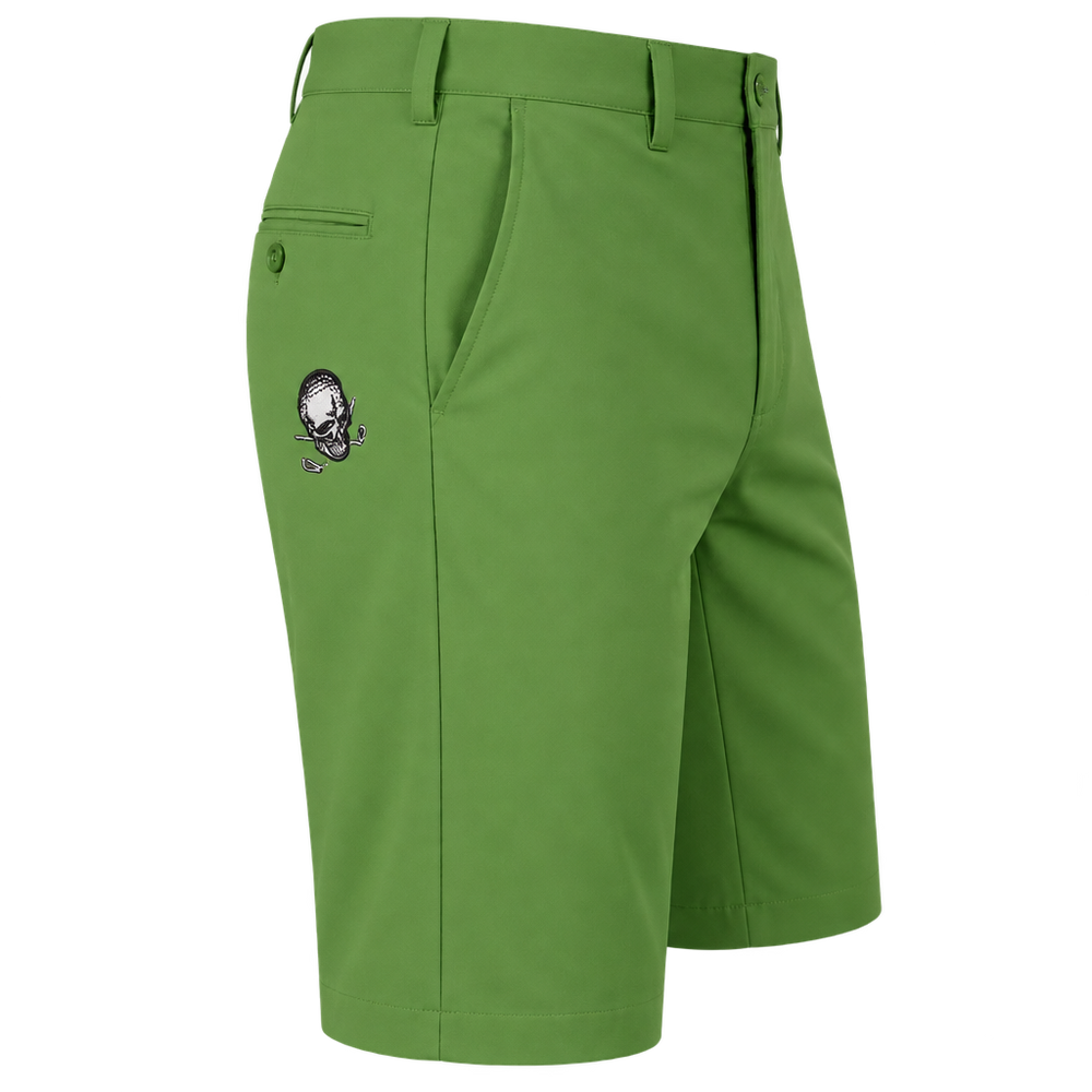 Angled view of green golf shorts showing belt loops, pockets and a small skull logo.