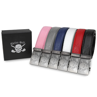 A collection of Tattoo Golf leather ratchet belts displayed in a row, with buckles down and a skull and crossbones design on the front. The belts are in various colors including pink, blue, white, black, and red.