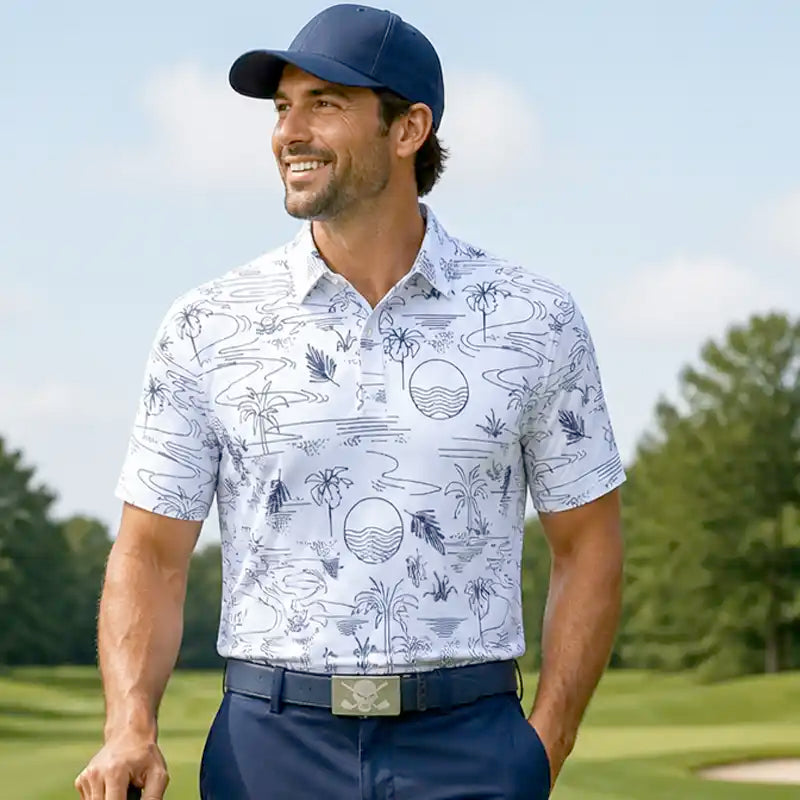 Man wearing a patterned shirt and navy cap on a golf course