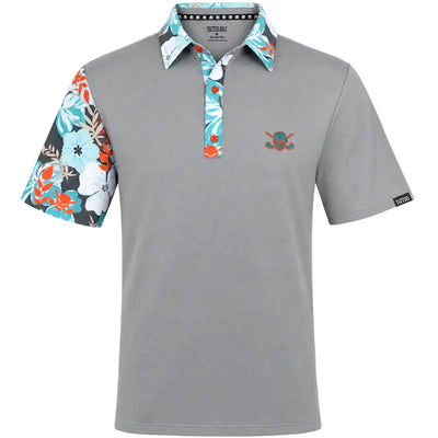 Front view of a grey VIP polo with teal floral collar, placket and right sleeve and a skull-and-crossed-clubs chest logo.