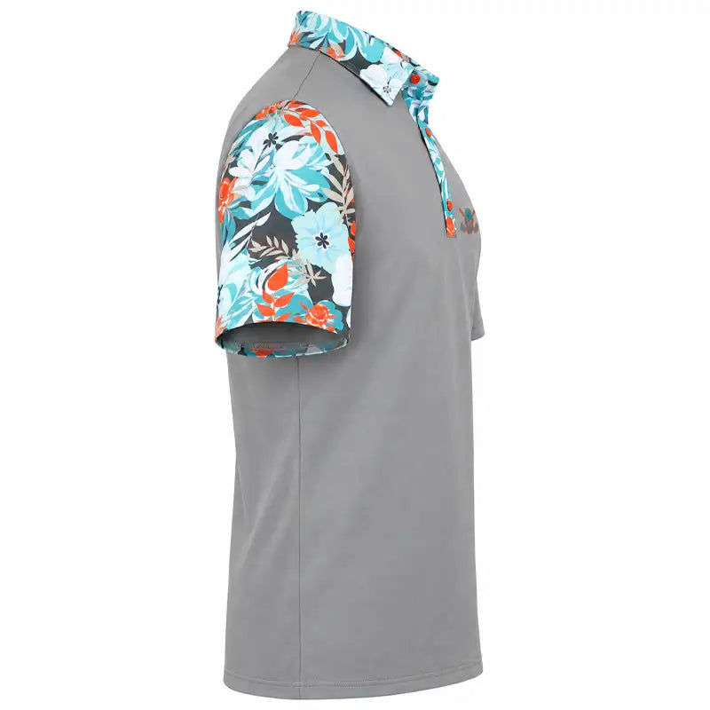 Right-side view of a grey VIP polo showing its teal, white and orange floral sleeve and collar.